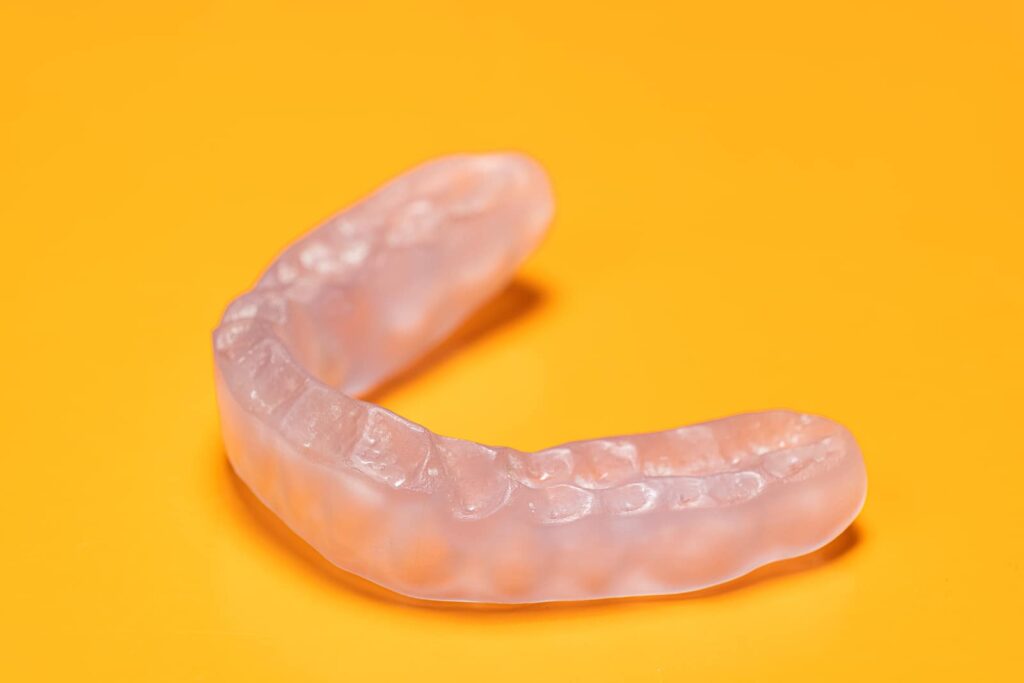 Dental mouthguard, splint for the treatment of dysfunction of the temporomandibular joints, bruxism, malocclusion, to relax the muscles of the jaw.